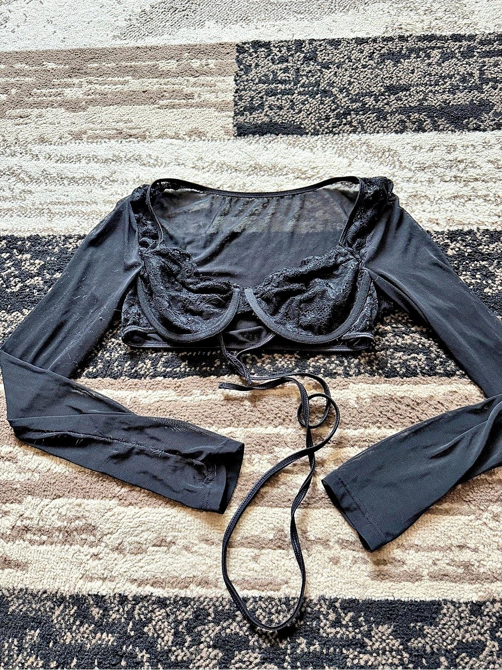 Women’s black lace long sleeve crop top with tie back detail